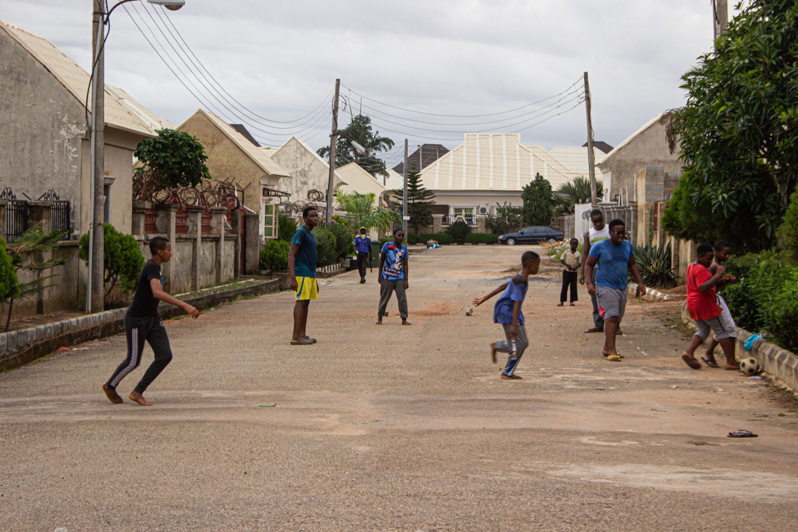 Kids playing football in the streets